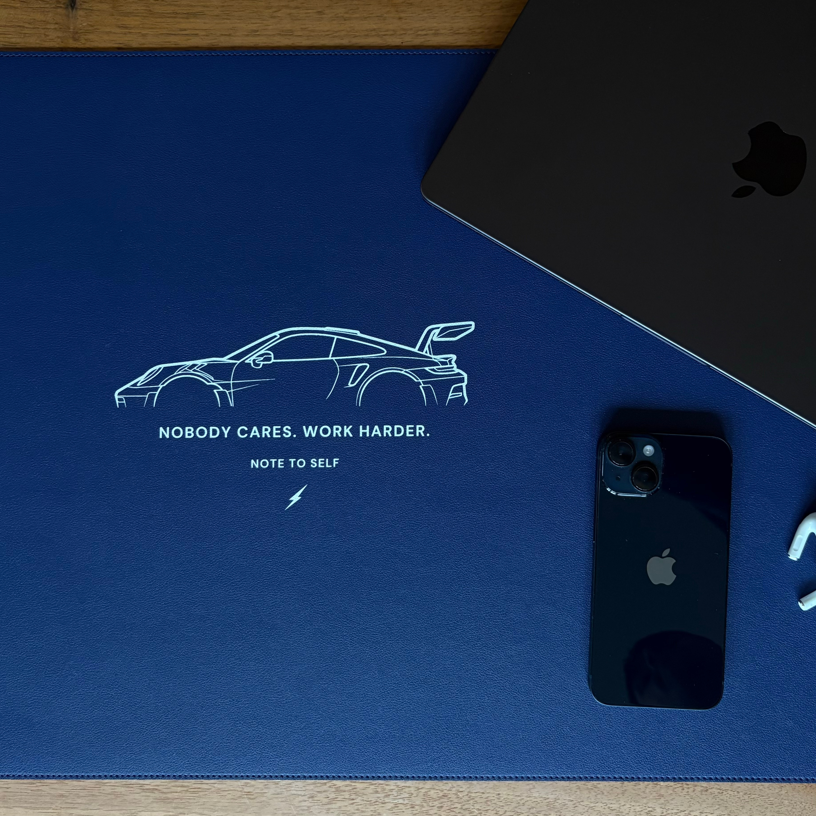 Produktbild Desk Pad in Ocean Blue Motivation: "Nobody Cares. Work Harder" Lifestyle Front